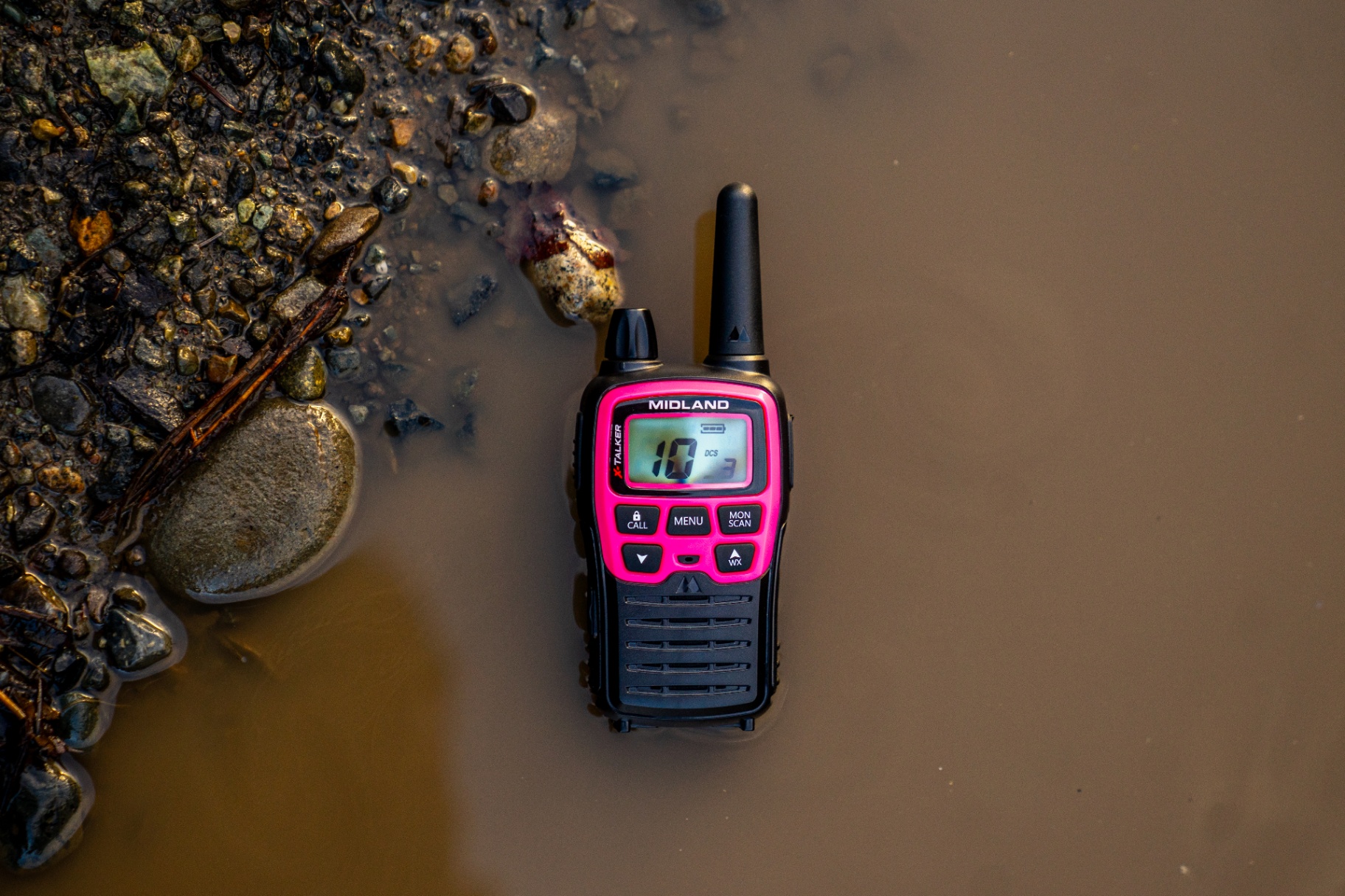 Midland X-Talker radio product shot in shallow water